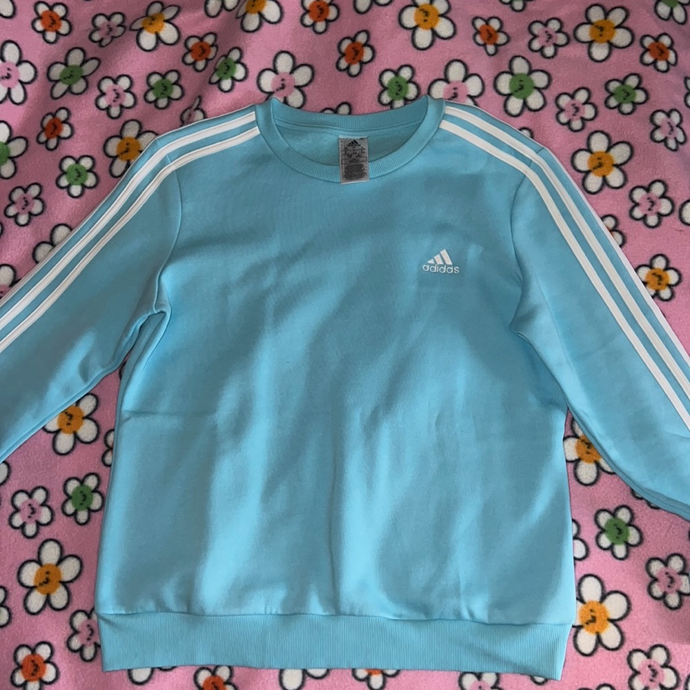 Selling a pullover adidas sweater,light blue,size large. (Brand new) never worn